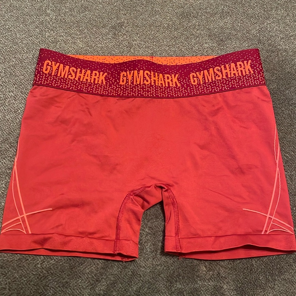 Gymshark shorts size medium, bright coral/orange/pink colour.